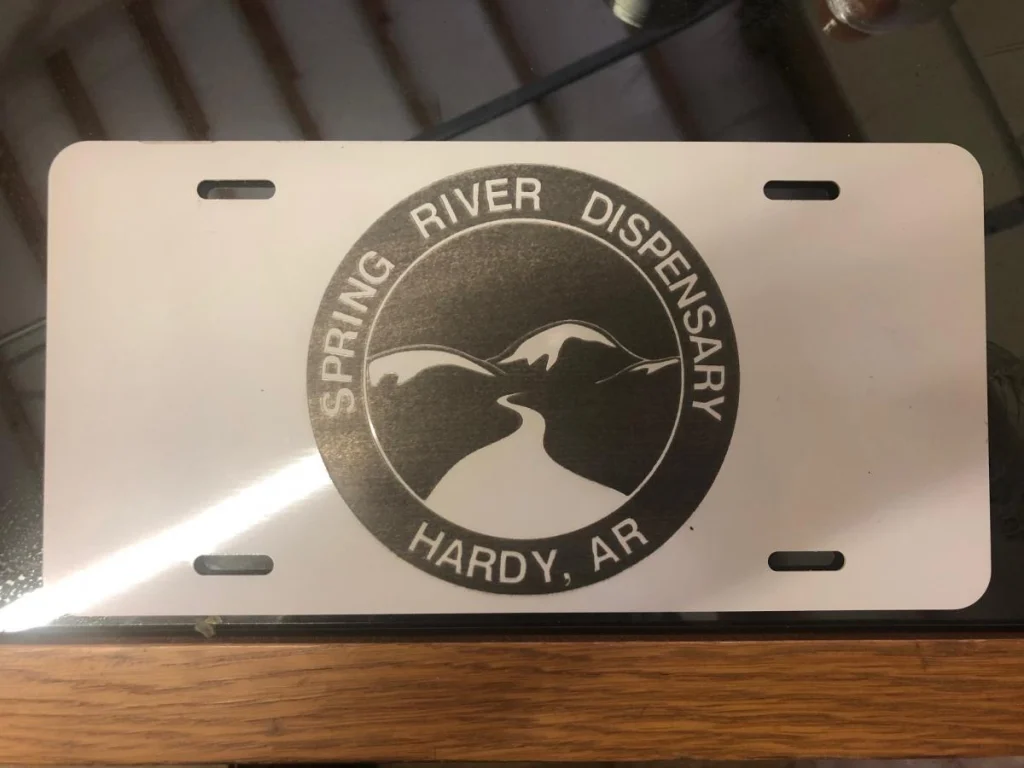 Spring River Dispensary logo plate